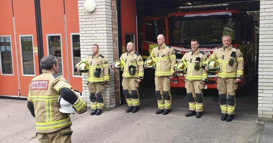 Tony O'Neill leading White Watch in formal parade at Tonypandy Fire Station, South Wales Fire and Rescue Service, marking the death of Queen Elizabeth II, September 2022